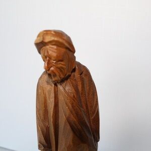 Beautiful fine art wooden figurine by Canadian artist, Paul E. Caron. Hand carve